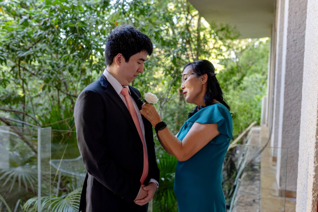 mother of the groom preps for destination wedding at paradisus playa del carmen